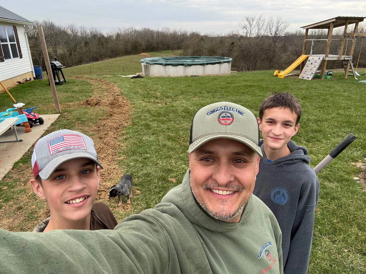 The Griggs family on a rural job site in Griggs Electric caps